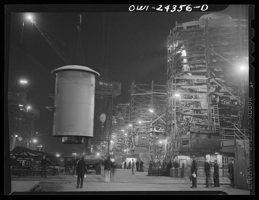 Bethlehem-Fairfield shipyards, Baltimore, Maryland. Lifting a stack from a truck