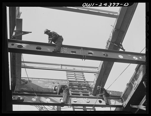 Untitled photo, possibly related to: Bethlehem-Fairfield shipyards, Baltimore, Maryland. Working on the hatch, shifting beam