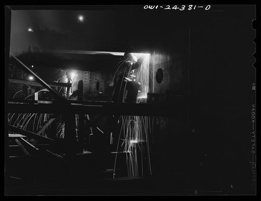 Bethlehem-Fairfield shipyards, Baltimore, Maryland. Welders at work on the after deck house
