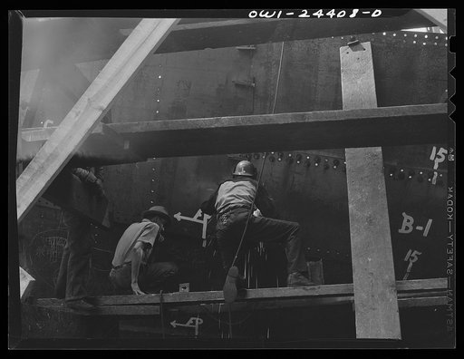 Bethlehem-Fairfield shipyards, Baltimore, Maryland. Working on a shell of a ship
