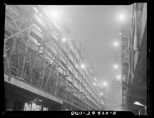 Untitled photo, possibly related to: Bethlehem-Fairfield shipyards, Baltimore, Maryland. Cranes working between shipways