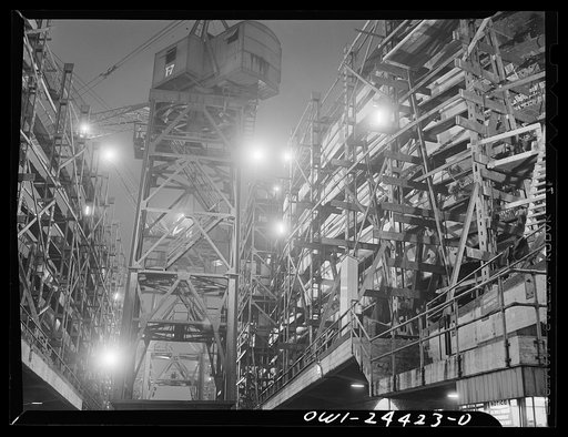 Bethlehem-Fairfield shipyards, Baltimore, Maryland. Cranes working between shipways