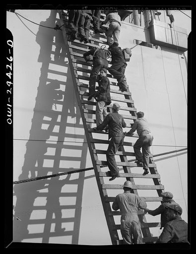 Bethlehem-Fairfield shipyards, Baltimore, Maryland. Workmen boarding a ship
