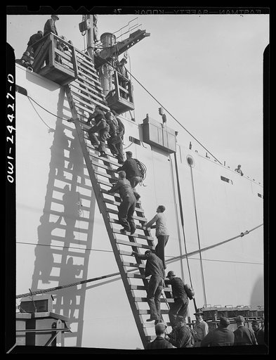 Bethlehem-Fairfield shipyards, Baltimore, Maryland. Workmen boarding a ship