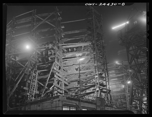 Bethlehem-Fairfield shipyards, Baltimore, Maryland. Working on a forepeak at night