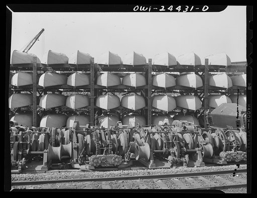 Untitled photo, possibly related to: Bethlehem-Fairfield shipyards, Baltimore, Maryland. Anchor windlass and lifeboats in storage