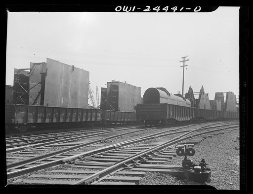 Bethlehem-Fairfield shipyards, Baltimore, Maryland. Bringing assembly sections to a stockyard