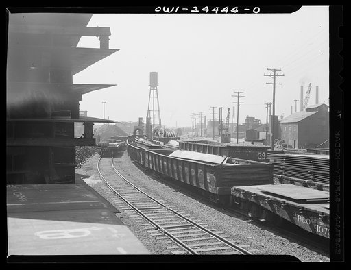 Bethlehem-Fairfield shipyards, Baltimore, Maryland. Cars waiting to be unloaded at a stockyard