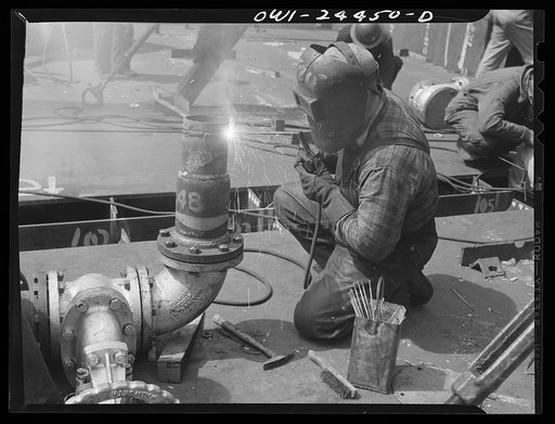 Bethlehem-Fairfield shipyards, Baltimore, Maryland. Welding piping