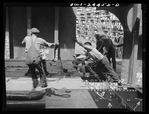 Bethlehem-Fairfield shipyards, Baltimore, Maryland. Erecting a transverse bulkhead