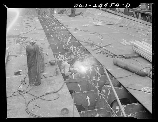 Bethlehem-Fairfield shipyards, Baltimore, Maryland. Welding a deck to a vertical keel