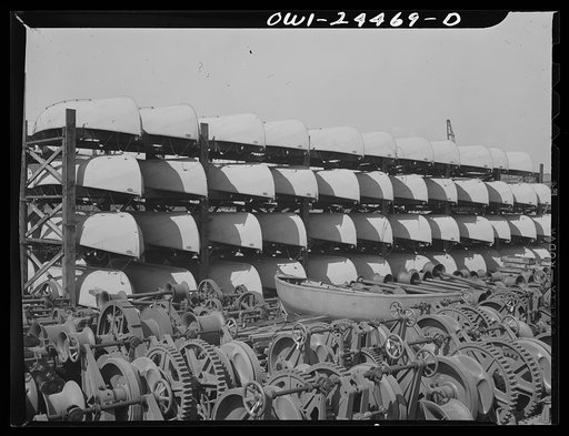 Bethlehem-Fairfield shipyards, Baltimore, Maryland. Anchor windlass and lifeboats in storage