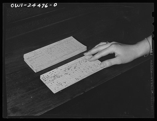 Bethlehem-Fairfield shipyards, Baltimore, Maryland. Punch time cards for pay accounting