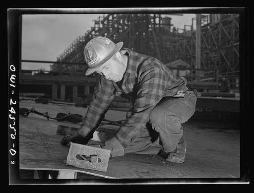 Richmond, California. Permanente Metals Corporation, shipbuilding division, yard number two. V. De Martini has worked in the yard for ten months. He was born in Italy, and has been in the United States thirty-four years