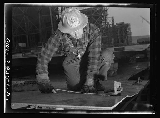 Richmond, California. Permanente Metals Corporation, shipbuilding division, yard number two. V. De Martini has worked in the yard for ten months. He was born in Italy, and has been in the United States thirty-four years