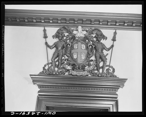 Untitled photo, possibly related to: Williamsburg, Virginia. The capitol of the Virginia colony during the eighteenth century was reconstructed and restored to its original state by John D. Rockefeller, Jr. during the 1930s. Coat of arms of the Virginia colony above the door in the General Courtroom