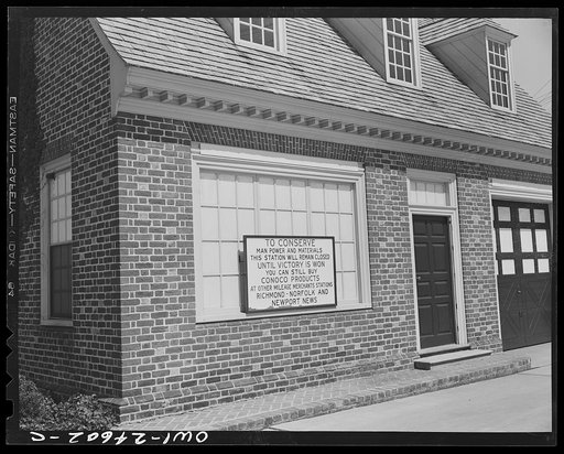 Williamsburg, Virginia. The capitol of the Virginia colony during the eighteenth century which was reconstructed and restored to its original state by John D. Rockefeller, Jr. during the 1930s. Sign on a gasoline station