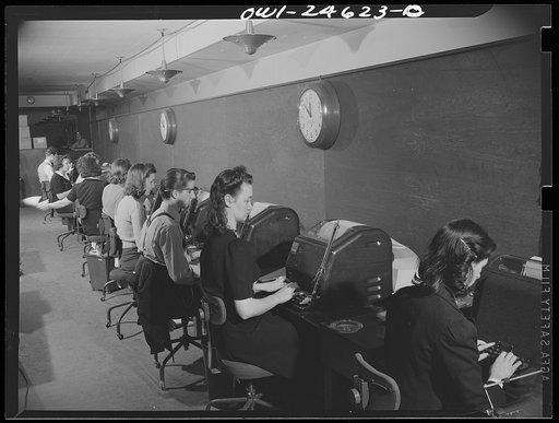 High school students doing part-time work in a government office