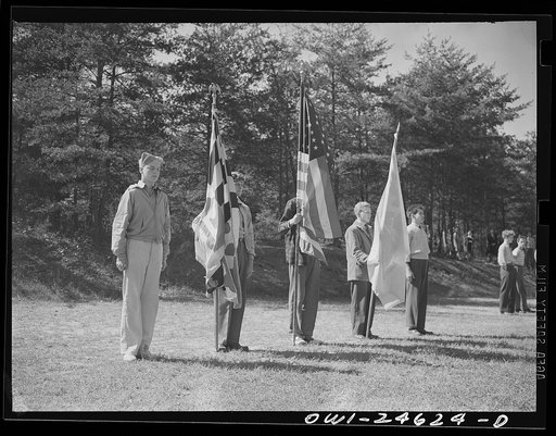 Untitled photo, possibly related to: Montgomery Blair High school Victory Corps. Members of the Victory Corps exhibited their best formations before Army, Navy, and civilian officials in Silver Spring, Maryland. The girls being reviewed are students of Montgomery Blair High School