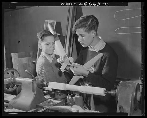 Untitled photo, possibly related to: Montgomery Blair High School, Silver Spring, Maryland. Making model planes according to Navy specifications to be used in the training of military and civilian personnel