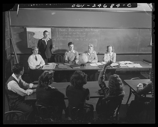 Untitled photo, possibly related to: High school Victory Corps. Young Americans study the problems of Democracy at war to prepare them for their future usefulness to their country. This panel discussion on inflation is typical of those held in social studies classes at Montgomery Blair High School, 