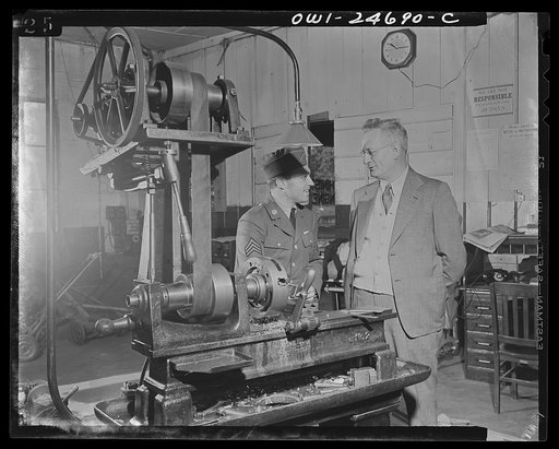 Untitled photo, possibly related to: Victory Corps boy doing shop work to relieve the manpower shortage
