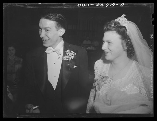 Untitled photo, possibly related to: Buffalo, New York. At the wedding of Cecelia Wrazen and Bronislaus Nowak, who are of Polish descent. They are employed at Ross Heater, makers of condensers for the Navy. He is temporarily deferred from the Army due to essential work. They apologized for the small
