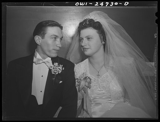 Untitled photo, possibly related to: Buffalo, New York. At the wedding of Cecelia Wrazen and Bronislaus Nowak, who are of Polish descent. They are employed at Ross Heater, makers of condensers for the Navy. He is temporarily deferred from the Army due to essential work. They apologized for the small