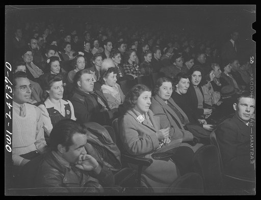 Buffalo, New York. Audience at late moving picture show which starts between 1:30 and 2 a.m. once a week especially for workers on the swing shift