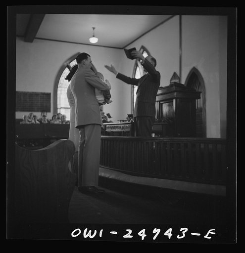 San Augustine, Texas. Reverend Dubberly, the Methodist minister, conducting a baptismal service on Easter Sunday