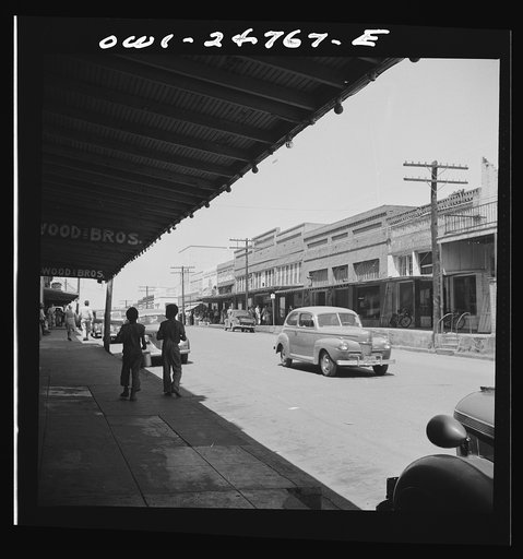 Untitled photo, possibly related to: San Augustine, Texas. People on the main street on Saturday afternoon