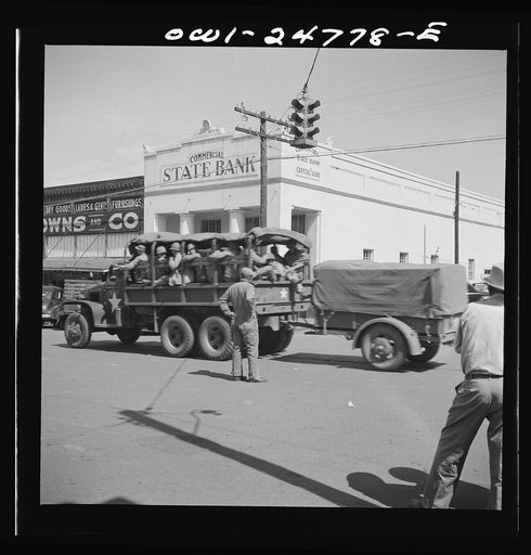 San Augustine, Texas. Troop movement through the main street