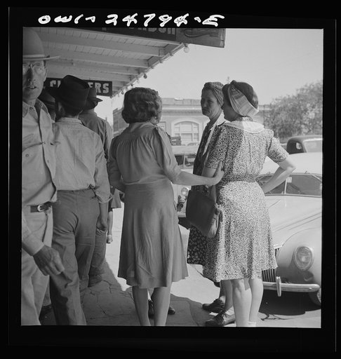 Untitled photo, possibly related to: San Augustine, Texas. People on the main street on Saturday afternoon