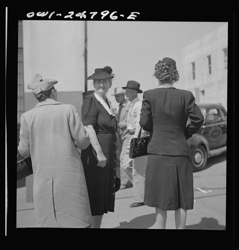 San Augustine, Texas. Women talking on the main street on Saturday afternoon