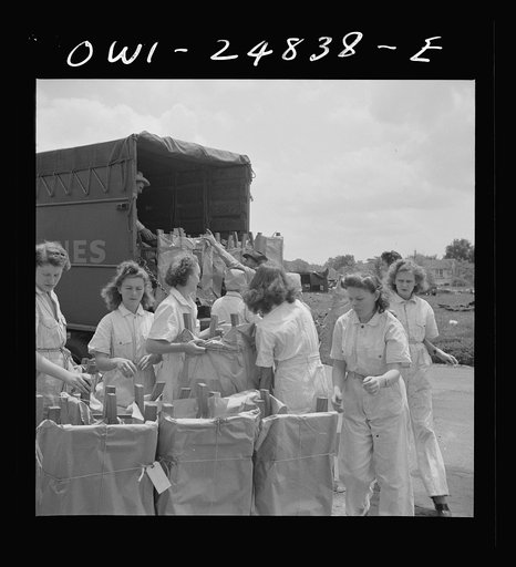 San Augustine, Texas. Girls loading chairs which they made in NYA (National Youth Administration) woodworking shop onto a truck