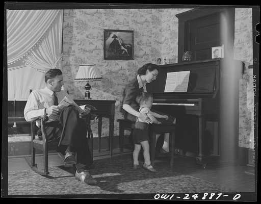San Augustine, Texas. Troy Mitchell, city manager, with his wife and youngest son at home