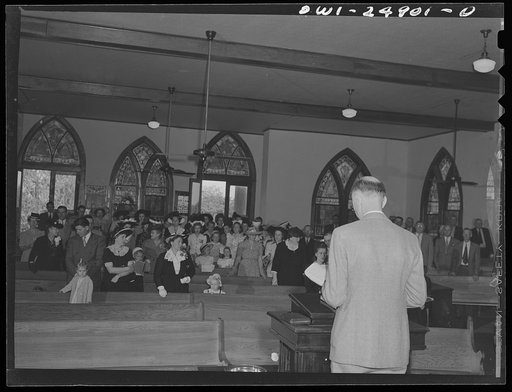 San Augustine, Texas. Congregation singing a hymn on Easter Sunday at the Methodist church