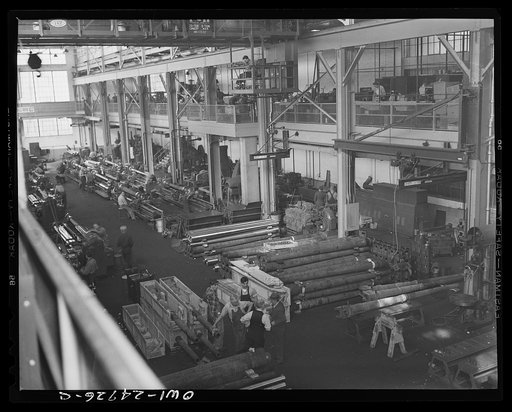 Untitled photo, possibly related to: Milwaukee, Wisconsin. War production workers making M5 and M7 guns for the U.S. Army. Lathes turning guns