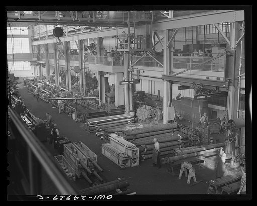 Untitled photo, possibly related to: Milwaukee, Wisconsin. War production workers making M5 and M7 guns for the U.S. Army. Lathes turning guns