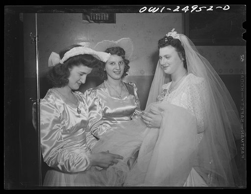 Buffalo, New York. At the wedding of Cecelia Wrazen and Bronislaus Nowak, who are of Polish descent. They are employed at Ross Heater, makers of condensers for the Navy. Cecelia with two of her bridesmaids