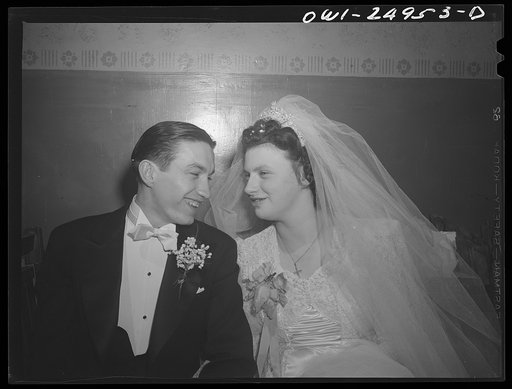 Buffalo, New York. At the wedding of Cecelia Wrazen and Bronislaus Nowak, who are of Polish descent. They are employed at Ross Heater, makers of condensers for the Navy. He is temporarily deferred from the Army due to essential work. They apologized for the smallness of the wedding, blamed it on rat