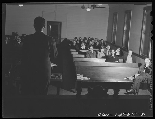 Untitled photo, possibly related to: San Augustine, Texas. Reverend Marsh Calloway and the song leader conducting evening service in the Presbyterian church