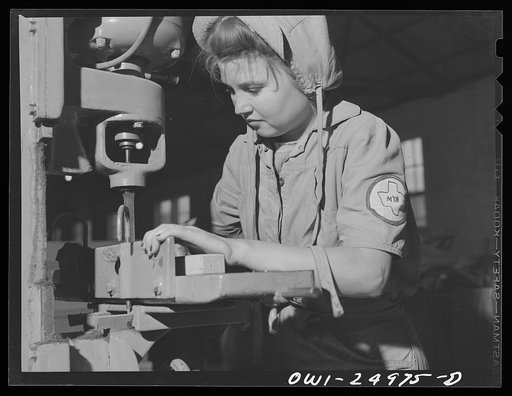San Augustine, Texas. Girl making chairs in the woodworking shop under the NYA (National Youth Administration) war training program