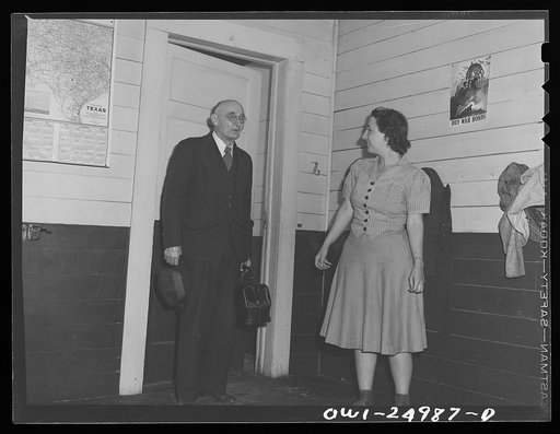 San Augustine, Texas. Dr. Schreiber arriving at a rural school to give typhoid innoculations