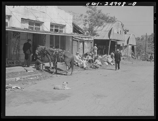 Untitled photo, possibly related to: San Augustine, Texas. Waiting for the opening of the regular Monday afternoon livestock auction