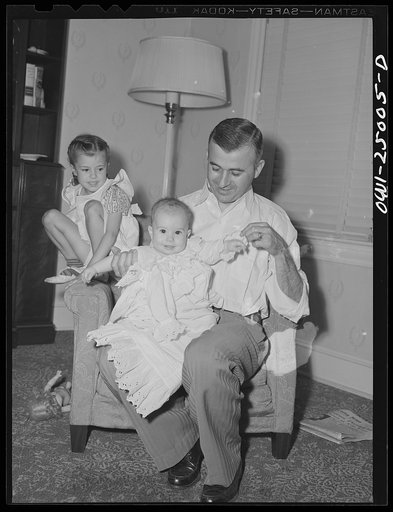 San Augustine, Texas. Mr. Ramsey, lawyer, at home with his two children