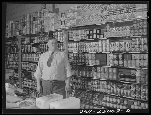 San Augustine, Texas. Clyde Smith in his grocery store. Mr. Smith is a member of the town council