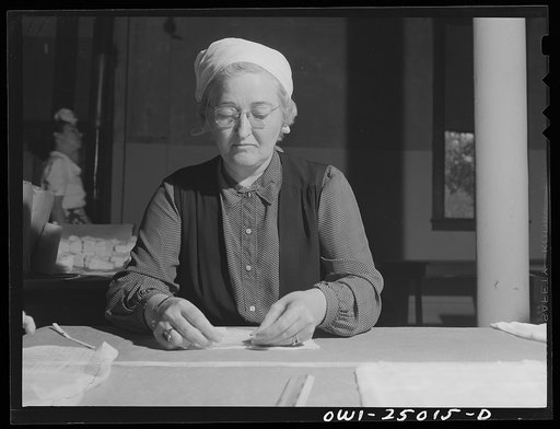 San Augustine, Texas. School teacher making bandages for the Red Cross