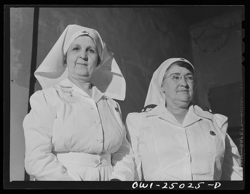 San Augustine, Texas. Mrs. Thomas, wife of the wholesale grocer, and Mrs. Rushing, wife of the mayor, in charge of making surgical dressings for the Red Cross