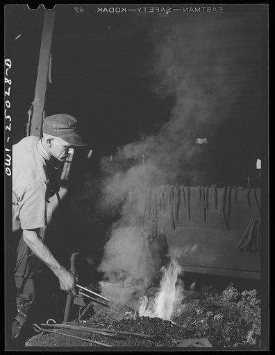 Untitled photo, possibly related to: San Augustine, Texas. Blacksmith